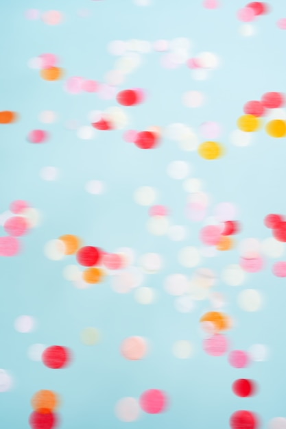Photo flying moving bright confetti. festive party background.