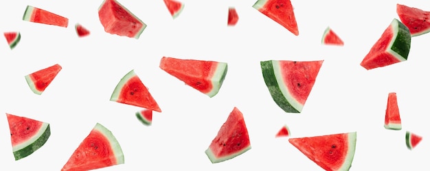 Flying watermelon slices close up on a white background