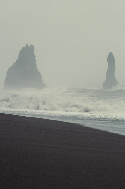 Foamy waves and cliffs landscape photo