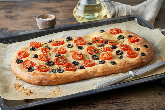 Focaccia with tomatoes and olives