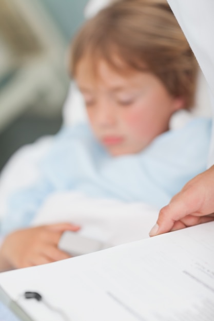 Photo focus on the clipboard of a doctor