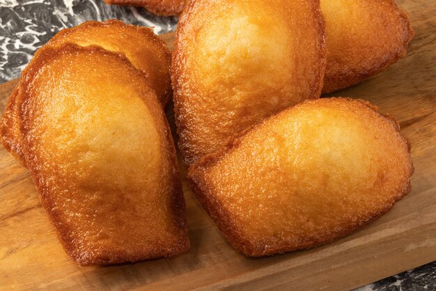 Focus on delicious Madeleine on cutting board