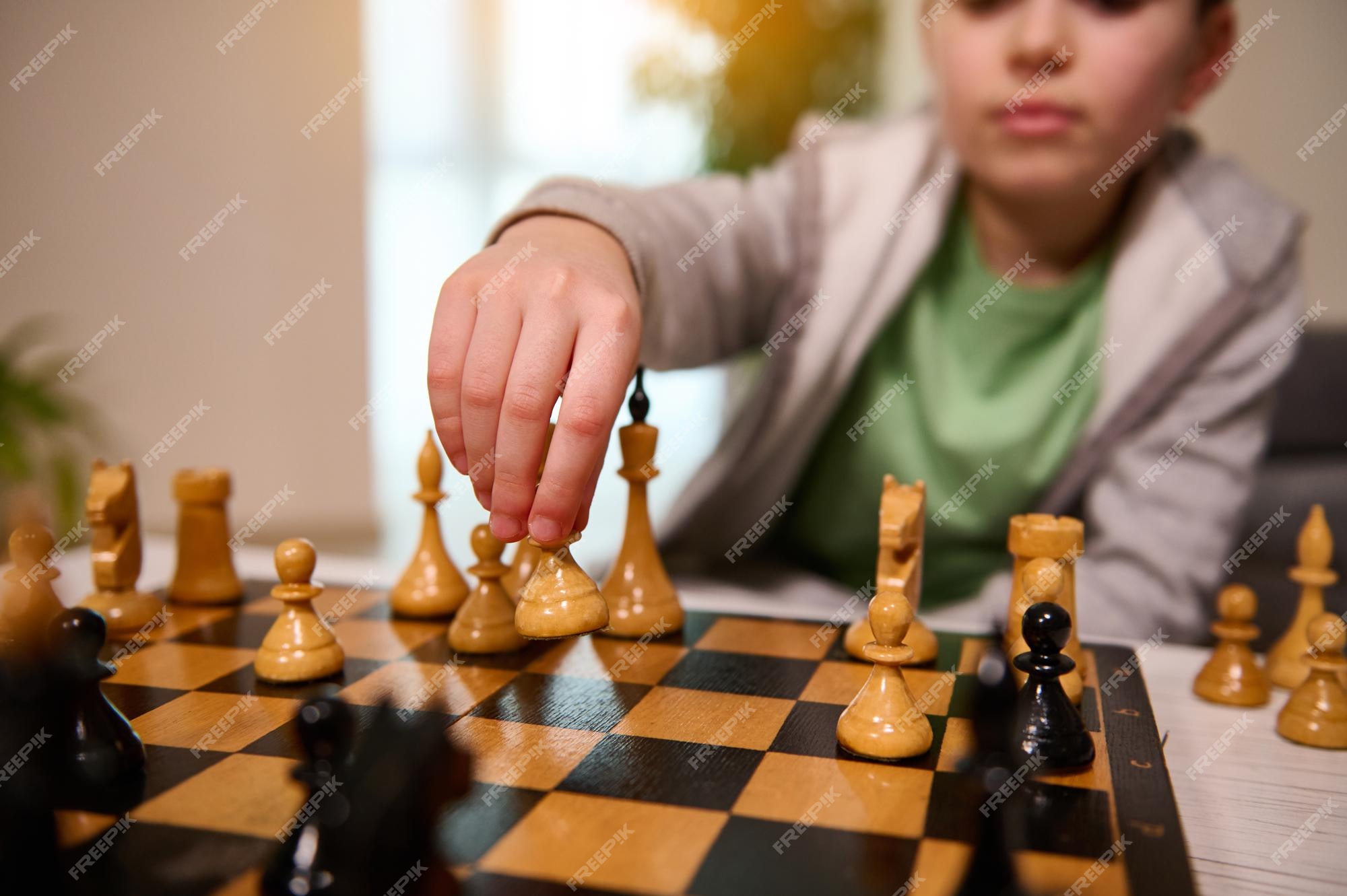 Handsome Male Model Considers His Next Chess Move Stock Photo - Download  Image Now - Chess, Chess Piece, Contemplation - iStock