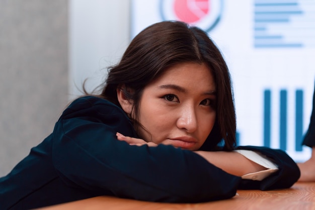 Focus portrait of asian female manger with blurred background in harmony