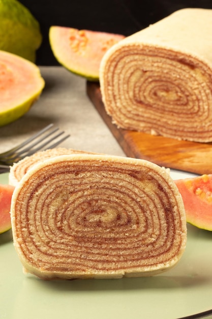 Focus on sliced roll cake stuffed with guava paste