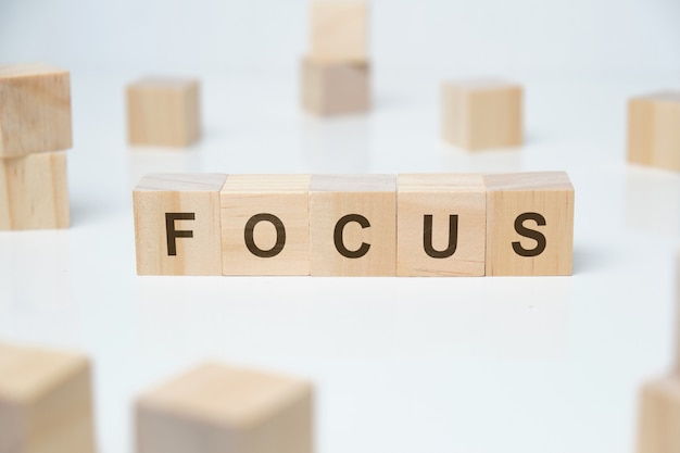 Photo focus word on wooden blocks