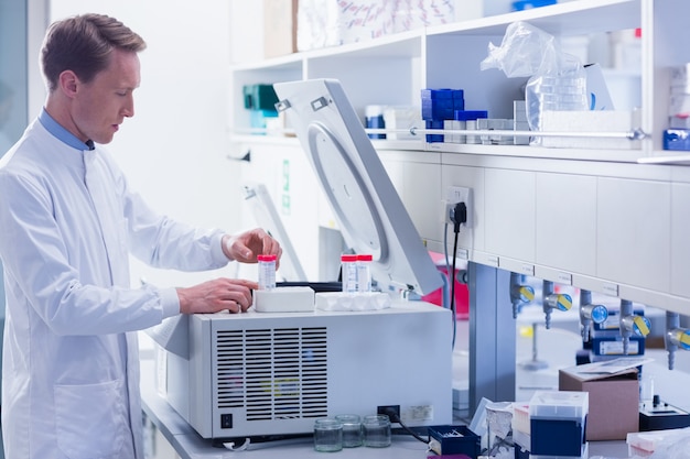 Focused chemist doing an experiment