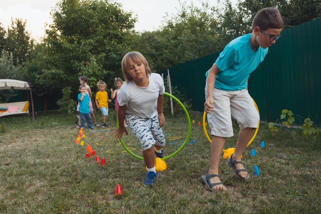 Photo the focused children are trying to win while competition