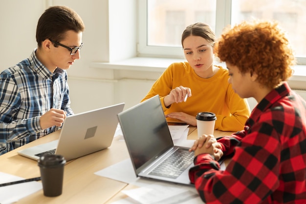 Photo focused female team leader discuss financial statistics brainstorming business meeting with partners