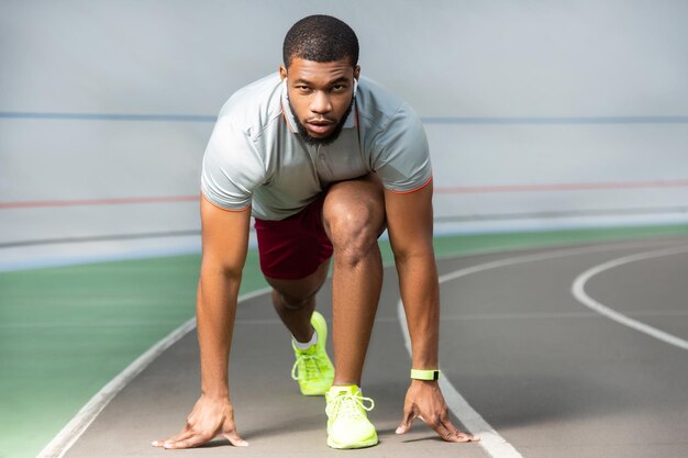 Focused fit professional young african american male runner