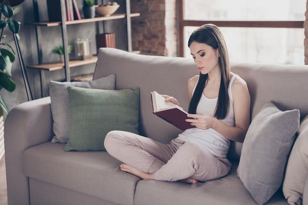 focused girl read book