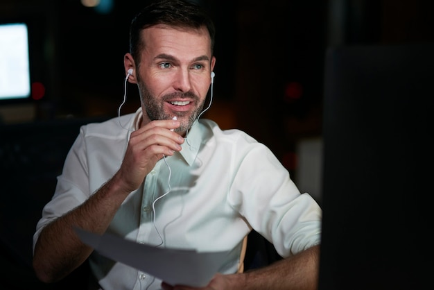 Focused man working at night