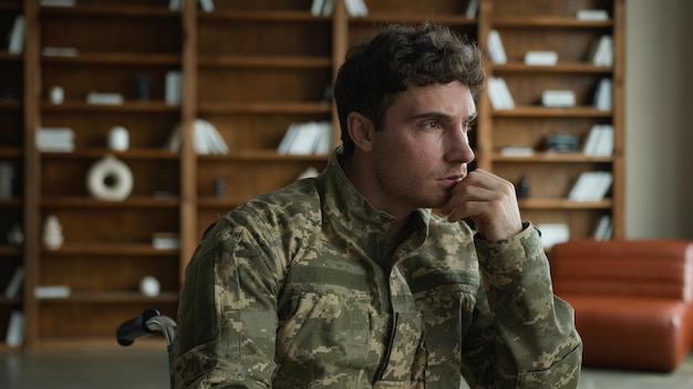 focused serious caucasian male officer camouflage uniform man person with disability military army