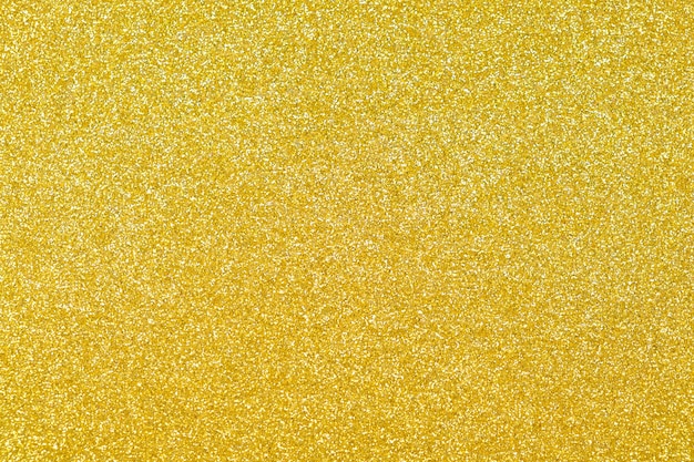 Focused yellow texture glitter background