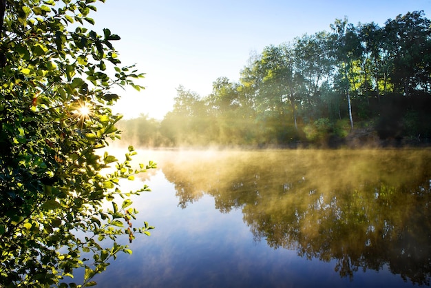 Fog on the morning river in late summer