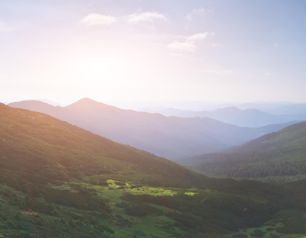 Fog and mountain morning landscape