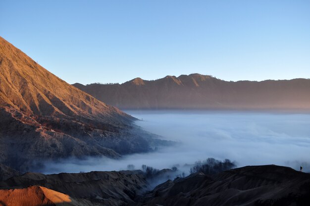 Foggy and beautiful sunrise at Mount Bromo