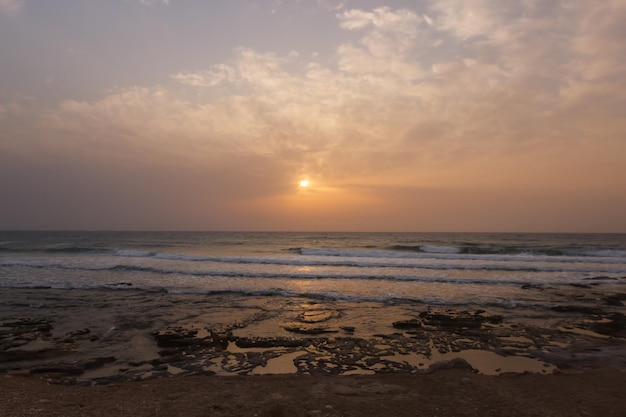 Foggy sunset on the beach near haifa