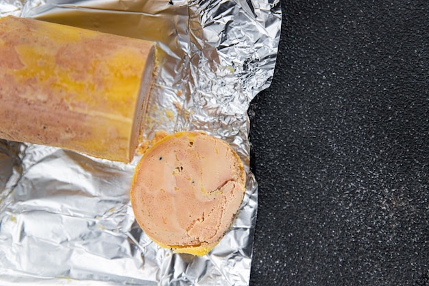 Foie gras block raw ready to cook ready to eat healthy eating cooking meal food snack on the table