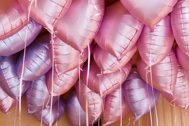 Foil balloons under the ceiling in the room