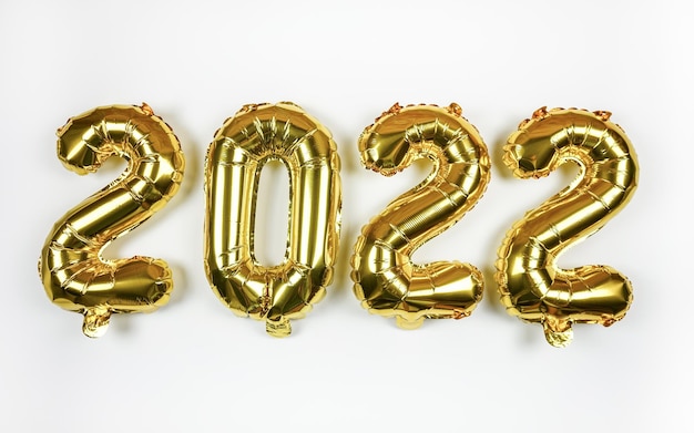 foil balloons numeral 2022 Happy new year 2022 holiday 2022 decoration holiday on white background