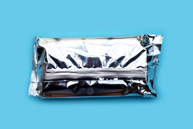 Photo foil package bag on blue background