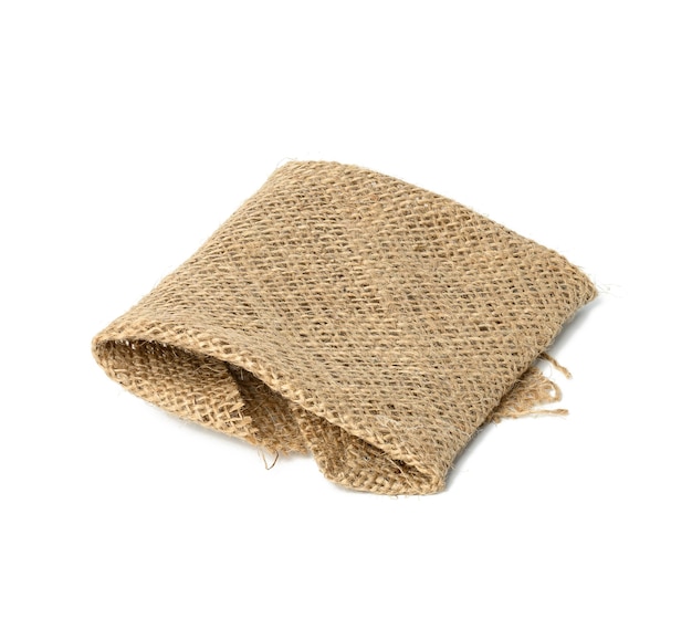 Folded brown burlap fabric and isoleted on white background