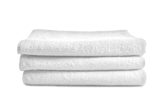 Photo folded clean terry towels on white background