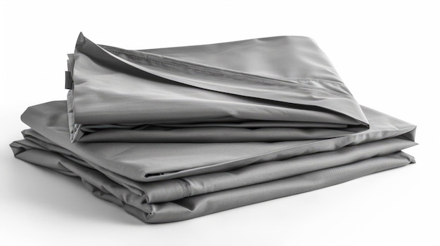 Folded grey cotton bedding sheets isolated on white