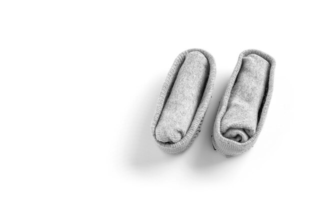 Folded socks on white background