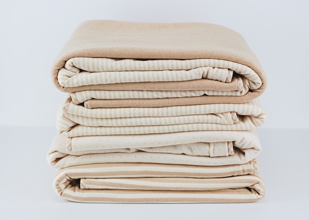 Folded up natural cotton blanket