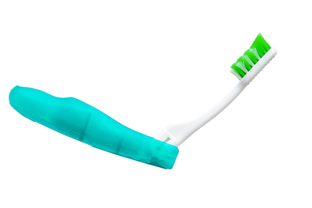 Foto spazzolino da denti pieghevole isolato su sfondo bianco igiene orale nei dispositivi di spostamento e cura personale in viaggio