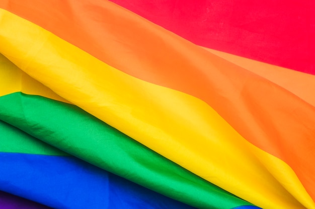 Folds of bright rainbow flag