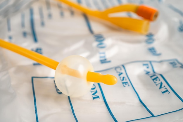 Foley urinary catheter with urine bag for disability or patient in hospital