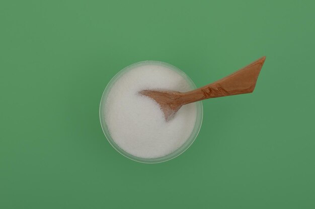 Photo food additive e575 gluconodeltalactone also known as gluconolactone pure gdl white powder