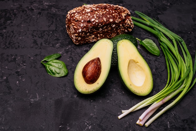 Food, avocado, healthy food. Avocado and brown bread 