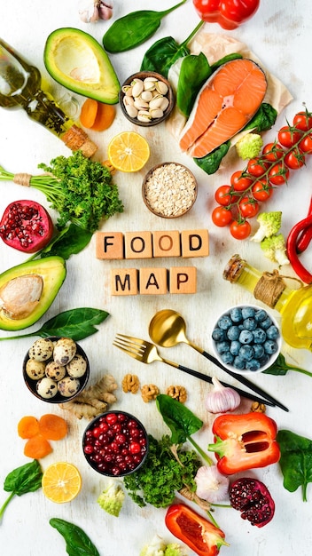 Food background Food map vegetables fruits fish meat nuts and other foods Top view Free copy space