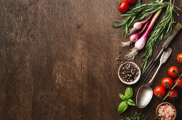 Food background fresh vegetables and herbs for cooking italian dishes banner top view