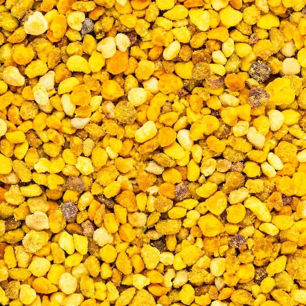 Photo food background from natural bee pollen grains