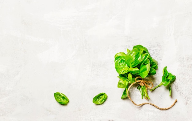 Food background with green basil flat lay top view