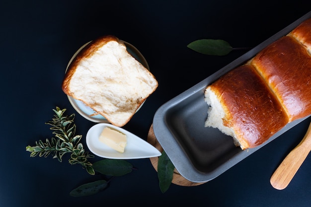 Food Baking concept Fresh baked organic homemade soft milk loaf bread in loaf pan