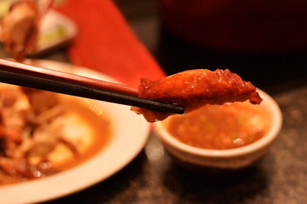 The food in the bowl is pork blood soup