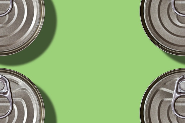 Photo food cans frame on green