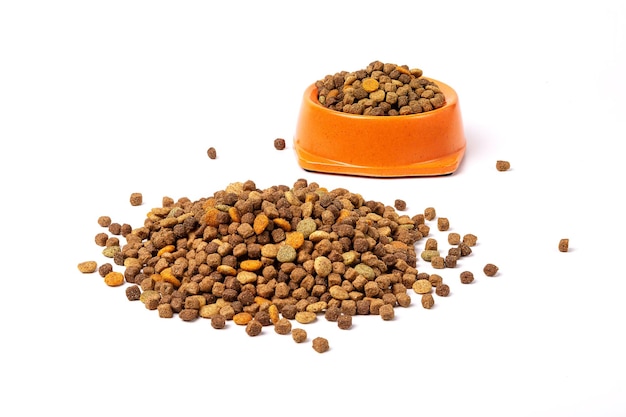 Food for cats and dogs in a bowl on a white background.