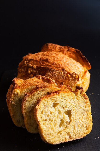 Food concept Artisan crusty cornbread on black background with copy space