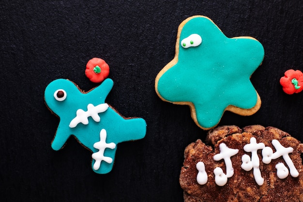 Food concept homemade fancy monster sugar cookies for party or halloween holiday