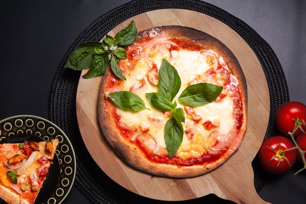 Food concept Homemade Tortilla Margherita pizza on wood board