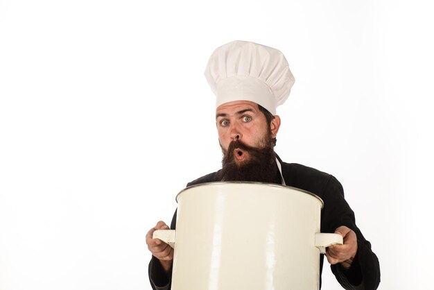 Food cuisine cookery and gastronomy kitchen utensils and professional cookery concept bearded man in