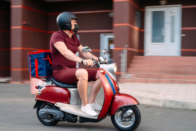 Food Delivery guy on a motorbike