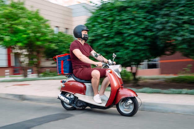 food delivery guy on a motorbike